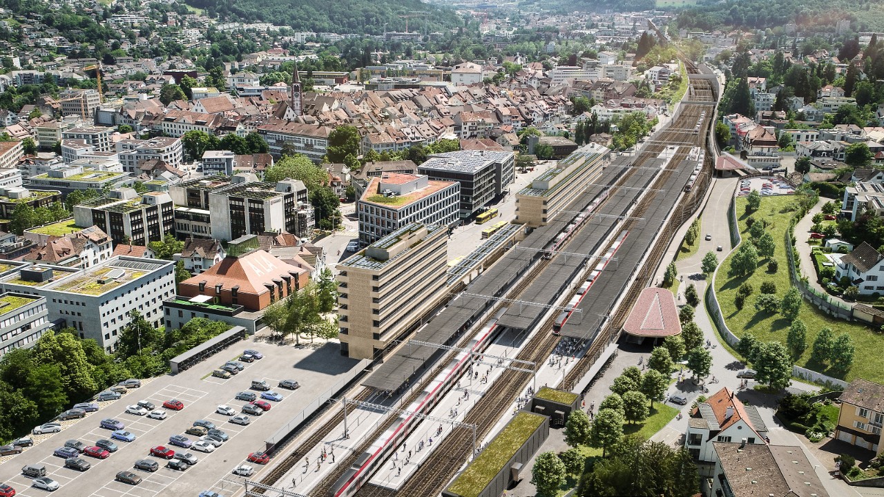 Die Visualisierung zeigt die neue Gleis- und Perronanlage des Bahnhofs Liestal von der Seite Basel her Richtung Olten gesehen. Links ersichtlich sind das neue Wohn- und Geschäftshaus sowie das neue Bahnhofgebäude, welche im Rahmen des Projekts Bahnofareal Liestal von SBB Immobilien erstellt werden.