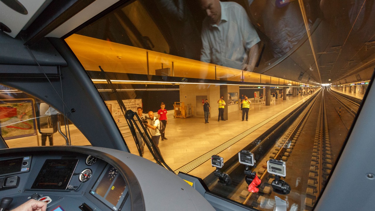 View of the platform and passengers from the driver’s cabin arriving in the new underground Löwenstrasse station in Zurich.