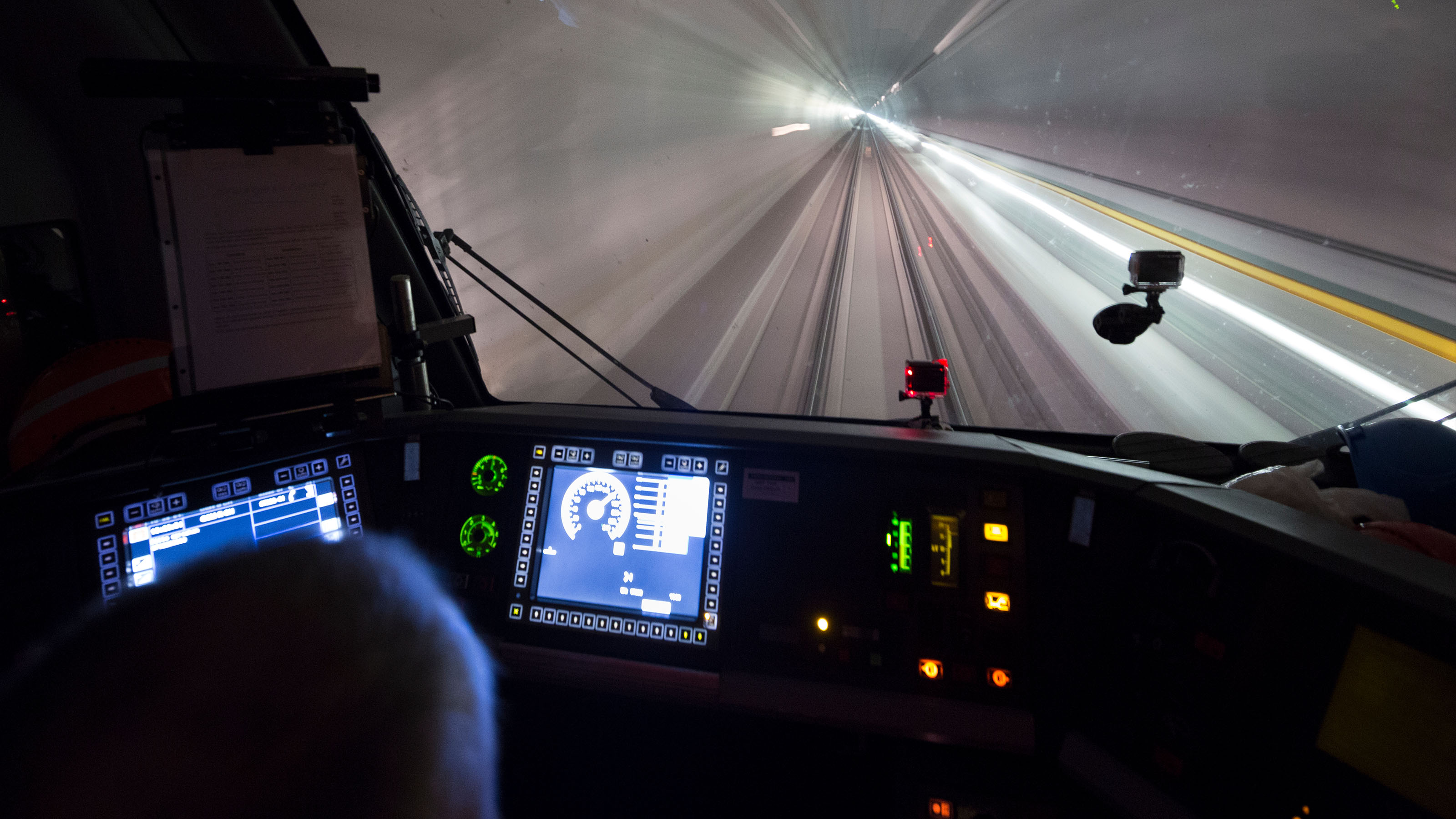 Close-up from the rear of an engine driver’s cab and in a railway tunnel, 2015.
