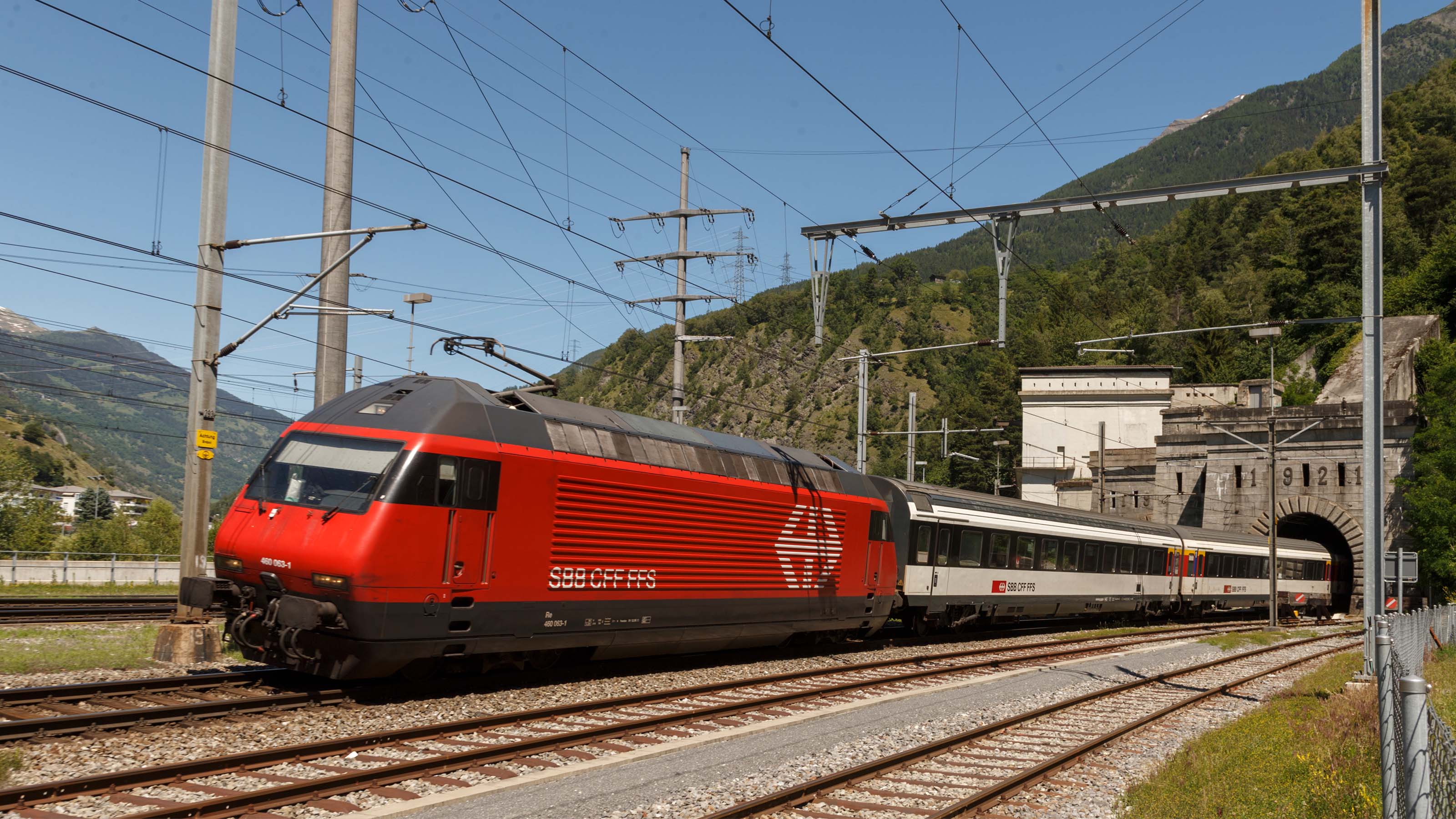 A train exits the Simplon tunnel north portal, 2016.